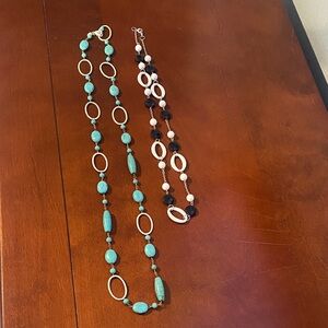 Two necklaces 
One is turquoise, the other is black and white.